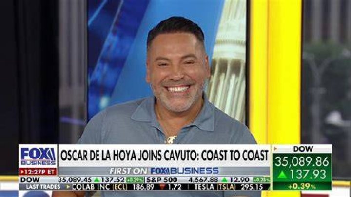 How did Oscar De La Hoya get rich?