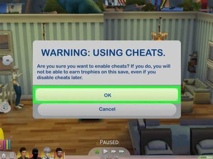 How do I enable cheats in Sims 4?