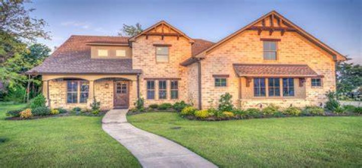 How is the sale of a jointly owned house divided?