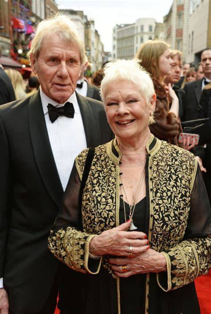 How many husbands has Judi Dench had?
