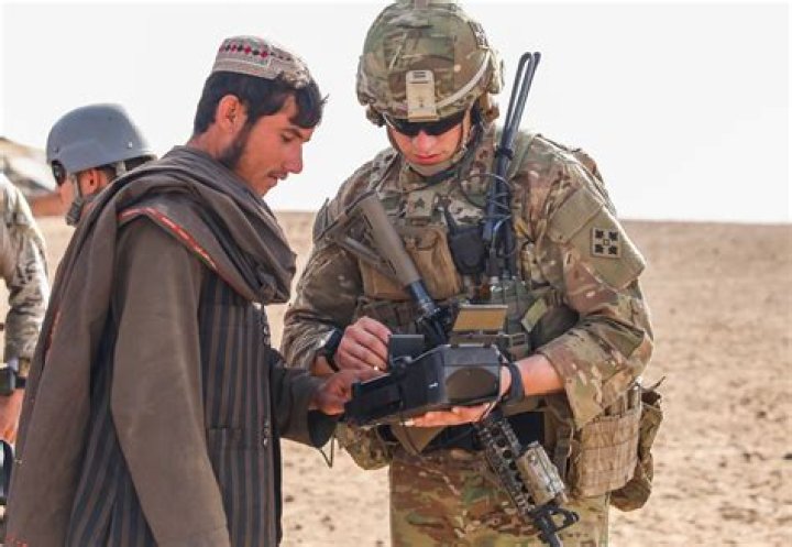 What are Afghan soldiers paid?