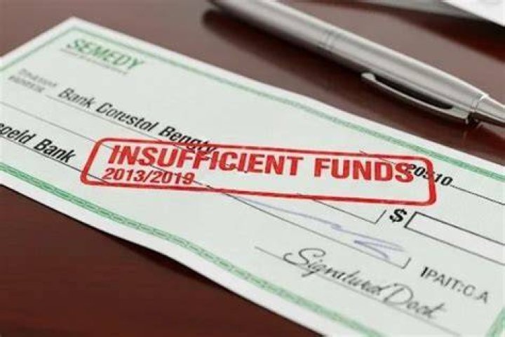 What is a consequence of writing a check that has insufficient funds?