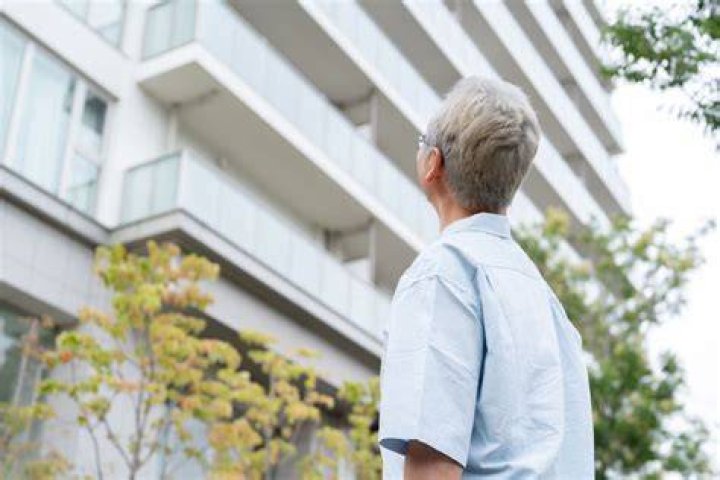 What is the role of a condominium management company?