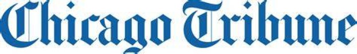 What year did the Chicago Tribune print its first newspaper?