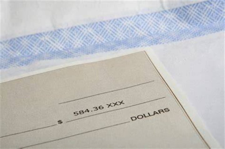 When should you throw away check stubs?