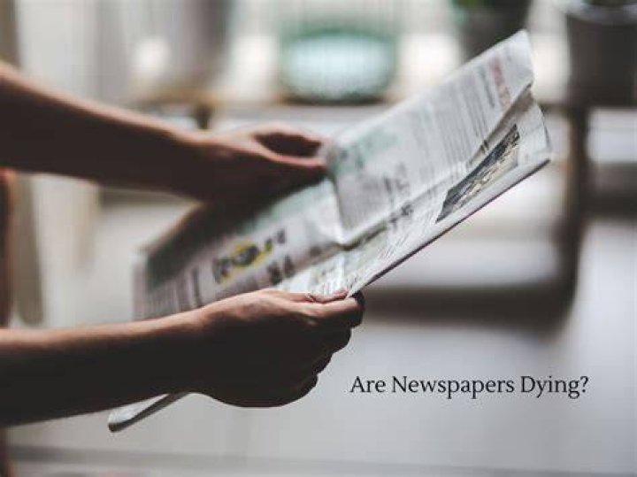 Why are newspapers dying?